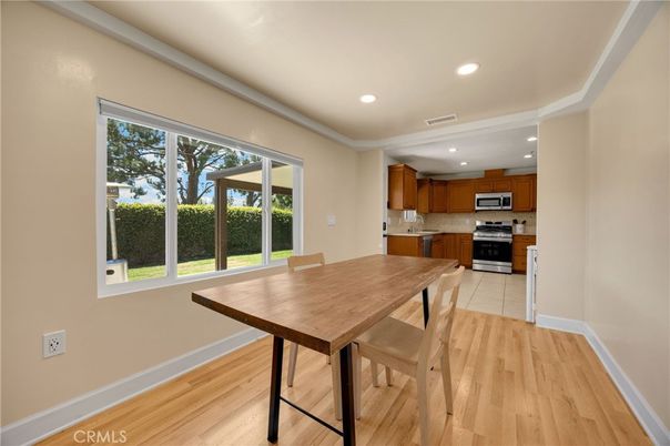 Dining room, Interior, Kitchen, Recessed Lighting, Stainless Steel Appliances, Wood Texture Flooring
