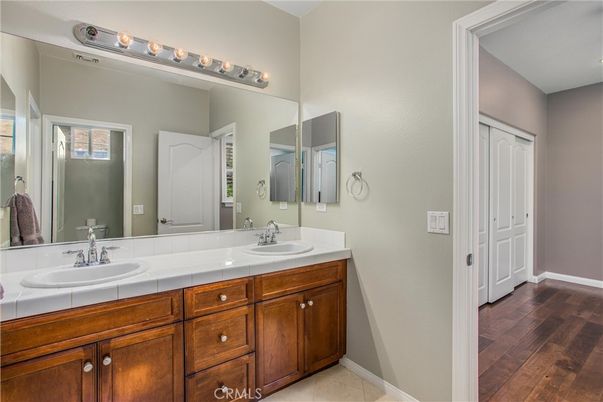 Bathroom, Dual Sink Vanities, Interior, Tile Countertops, Wood Texture Flooring