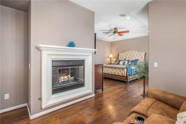 Bedroom, Fireplace, Interior, Recessed Lighting, Wood Texture Flooring