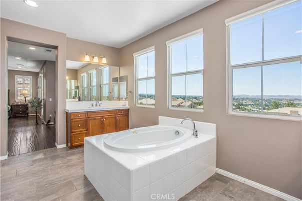 Bathroom, Dual Sink Vanities, Interior, Recessed Lighting, Wood Texture Flooring