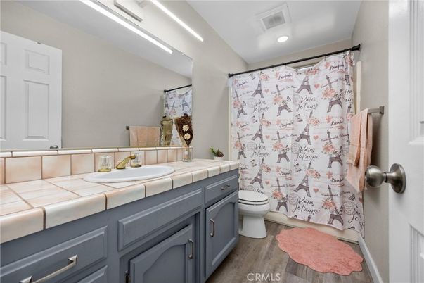 Bathroom, Interior, Recessed Lighting, Tile Countertops, Wood Texture Flooring