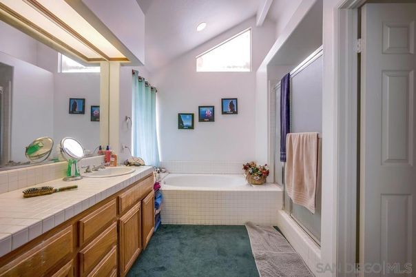Bathroom, Dual Sink Vanities, Interior, Recessed Lighting, Tile Countertops