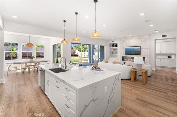 Dining room, Fireplace, Interior, Kitchen, Living room, Pendant Lights, Recessed Lighting, Stone Walls, Wood Texture Flooring