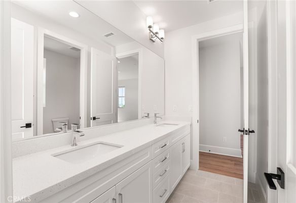 Bathroom, Dual Sink Vanities, Interior, Recessed Lighting, Wood Texture Flooring