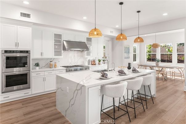 Dining room, Interior, Kitchen, Marble Walls, Pendant Lights, Recessed Lighting, Stainless Steel Appliances, Wood Texture Flooring