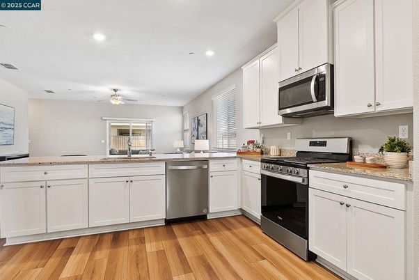 Interior, Kitchen, Recessed Lighting, Stainless Steel Appliances, Wood Texture Flooring