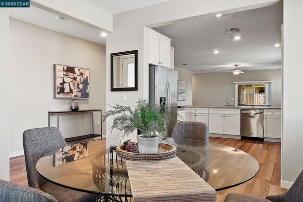 Dining room, Interior, Kitchen, Recessed Lighting, Stainless Steel Appliances, Wood Texture Flooring