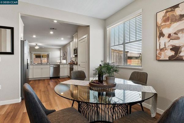 Dining room, Interior, Kitchen, Recessed Lighting, Stainless Steel Appliances, Wood Texture Flooring