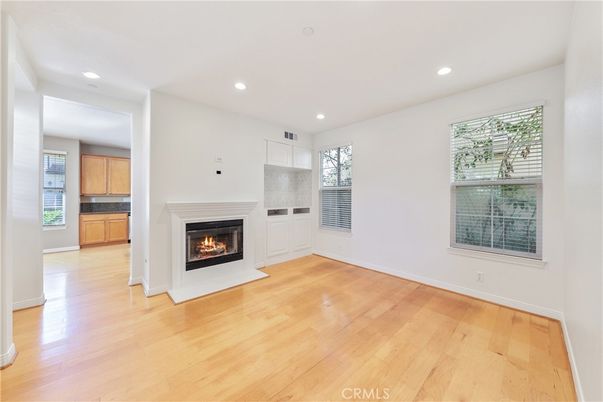 Empty room, Fireplace, Interior, Recessed Lighting, Wood Texture Flooring