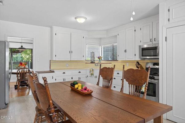 Dining room, Interior, Kitchen, Pendant Lights, Stainless Steel Appliances, Wood Texture Flooring
