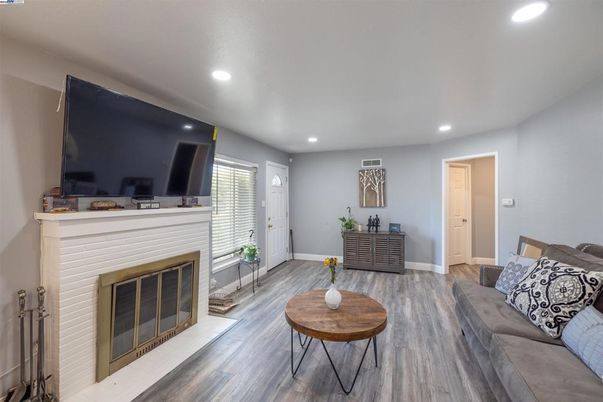 Fireplace, Interior, Living room, Recessed Lighting, Wood Texture Flooring