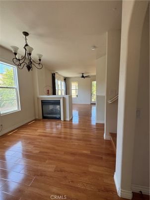Chandelier, Empty room, Fireplace, Interior, Wood Texture Flooring