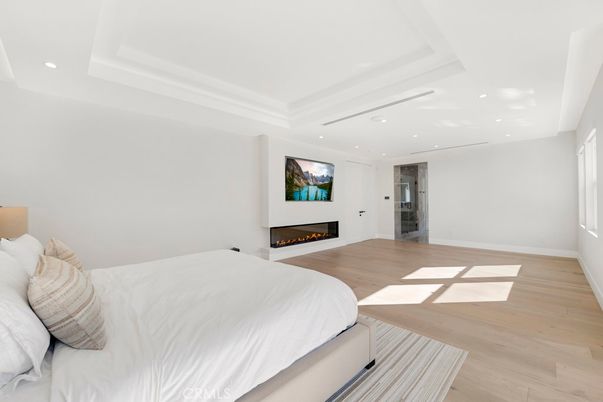 Bedroom, Fireplace, Interior, Recessed Lighting, Wood Texture Flooring