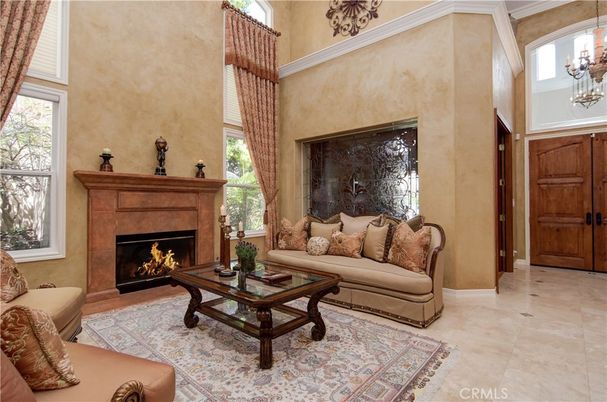 Chandelier, Fireplace, Interior, Living room