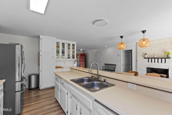 Fireplace, Interior, Kitchen, Pendant Lights, Recessed Lighting, Stone Walls, Wood Texture Flooring
