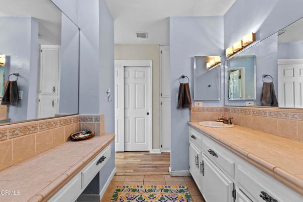 Bathroom, Dual Sink Vanities, Interior, Tile Countertops, Wood Texture Flooring
