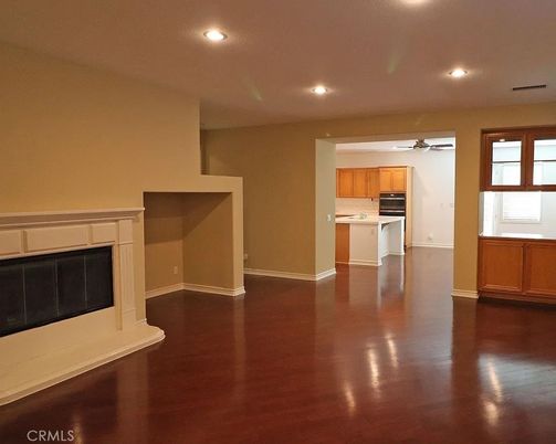 Empty room, Fireplace, Interior, Kitchen, Recessed Lighting, Wood Texture Flooring