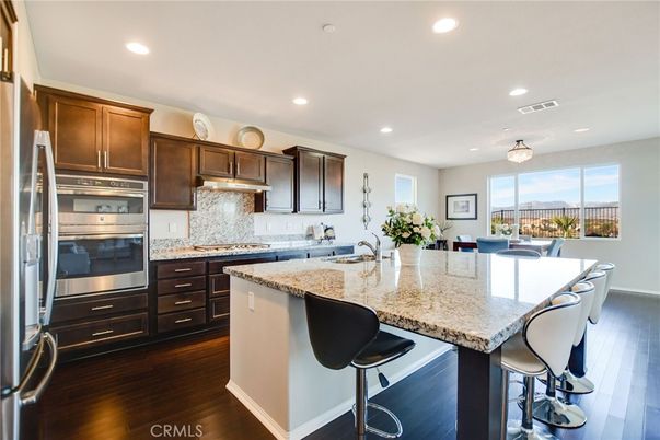 Dining room, Interior, Kitchen, Recessed Lighting, Stainless Steel Appliances, Wood Texture Flooring