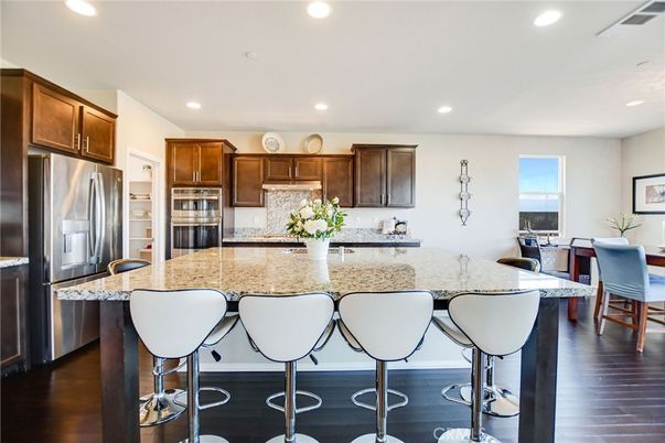 Dining room, Interior, Kitchen, Recessed Lighting, Stainless Steel Appliances, Wood Texture Flooring