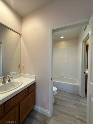 Bathroom, Interior, Recessed Lighting, Tile Countertops, Wood Texture Flooring