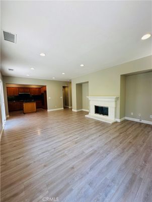 Empty room, Fireplace, Interior, Recessed Lighting, Wood Texture Flooring
