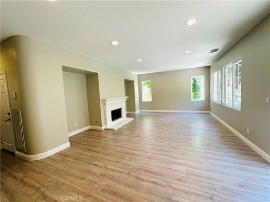 Empty room, Fireplace, Interior, Recessed Lighting, Wood Texture Flooring
