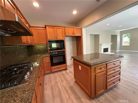 Fireplace, Interior, Kitchen, Recessed Lighting, Wood Texture Flooring