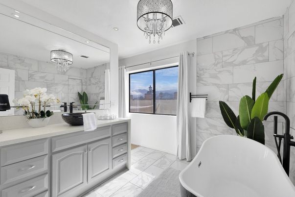 Bathroom, Chandelier, Dual Sink Vanities, Free Standing Baths, Interior, Marble, Marble Walls, Recessed Lighting