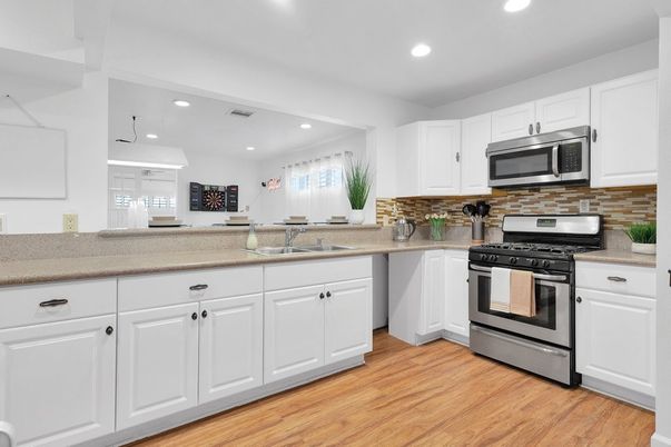 Interior, Kitchen, Recessed Lighting, Stainless Steel Appliances, Wood Texture Flooring