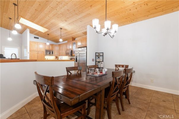 Chandelier, Dining room, Interior, Kitchen, Pendant Lights, Stainless Steel Appliances, Wooden Ceilings