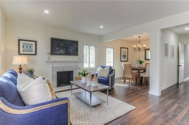 Chandelier, Dining room, Fireplace, Interior, Living room, Recessed Lighting, Wood Texture Flooring