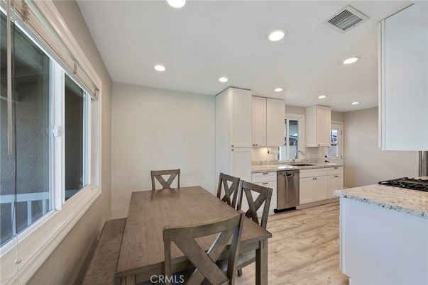 Dining room, Interior, Kitchen, Recessed Lighting, Stainless Steel Appliances, Wood Texture Flooring