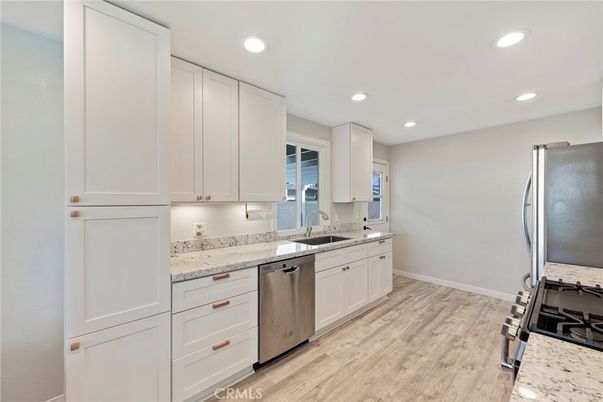 Interior, Kitchen, Recessed Lighting, Stainless Steel Appliances, Wood Texture Flooring