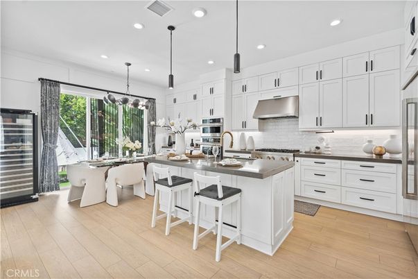 Dining room, Interior, Kitchen, Pendant Lights, Recessed Lighting, Stainless Steel Appliances, Wood Texture Flooring