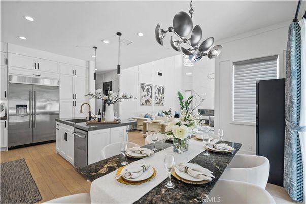 Dining room, Interior, Kitchen, Pendant Lights, Recessed Lighting, Stainless Steel Appliances, Wood Texture Flooring