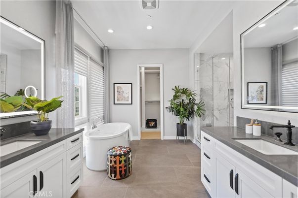 Bathroom, Dual Sink Vanities, Fireplace, Glass Shower, Interior, Marble Walls, Recessed Lighting
