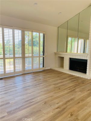 Empty room, Fireplace, Interior, Recessed Lighting, Wood Texture Flooring