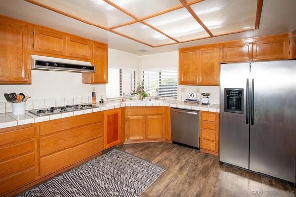Interior, Kitchen, Tile Countertops, Wood Texture Flooring
