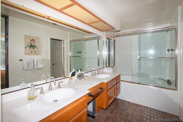 Bathroom, Dual Sink Vanities, Glass Shower, Interior, Wood Texture Flooring