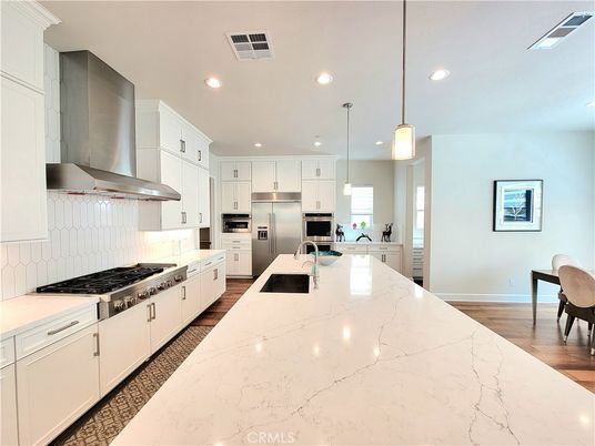 Interior, Kitchen, Pendant Lights, Recessed Lighting, Stainless Steel Appliances, Wood Texture Flooring