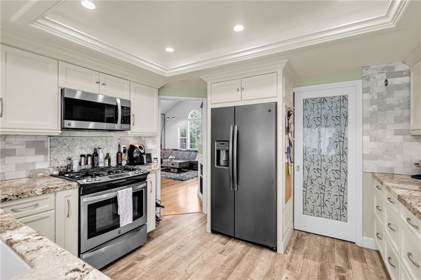 Interior, Kitchen, Recessed Lighting, Stainless Steel Appliances, Wood Texture Flooring