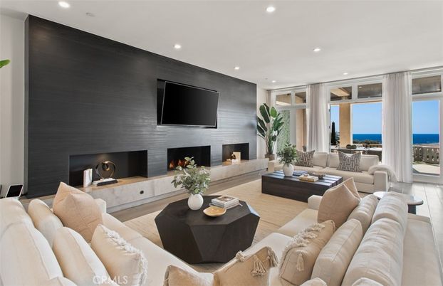 Fireplace, Interior, Living room, Recessed Lighting, Water, Wood Texture Flooring