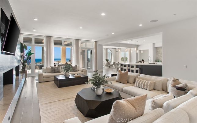 Dining room, Fireplace, Interior, Kitchen, Living room, Pendant Lights, Recessed Lighting, Water, Wood Texture Flooring