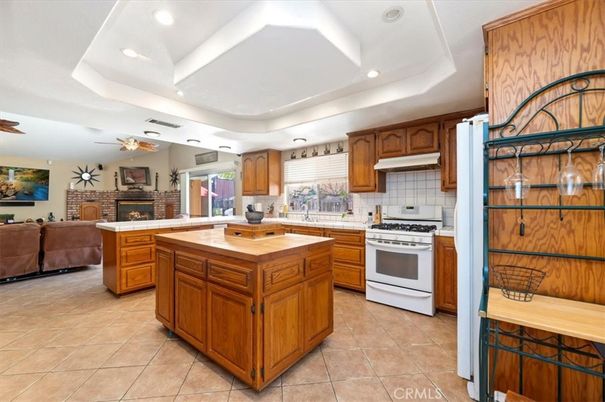 Fireplace, Interior, Kitchen, Living room, Recessed Lighting, Stainless Steel Appliances, Tile Countertops
