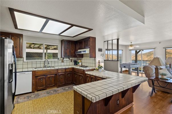 Dining room, Interior, Kitchen, Tile Countertops, Wood Texture Flooring