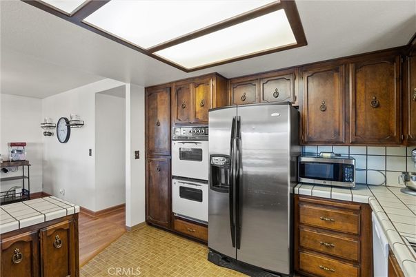 Interior, Kitchen, Tile Countertops, Wood Texture Flooring