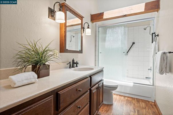 Bathroom, Dual Sink Vanities, Glass Shower, Interior, Wood Texture Flooring