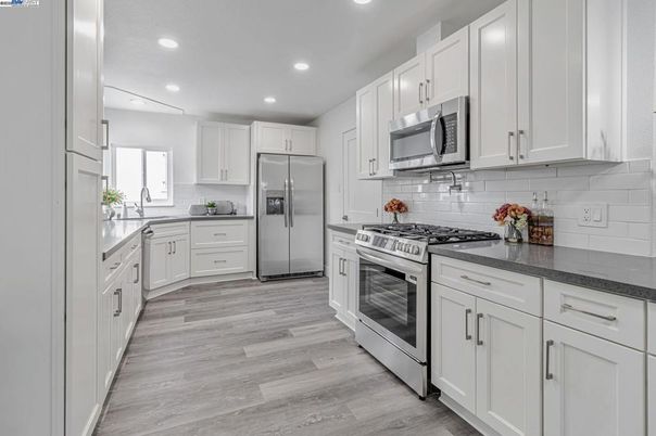 Interior, Kitchen, Recessed Lighting, Stainless Steel Appliances, Wood Texture Flooring
