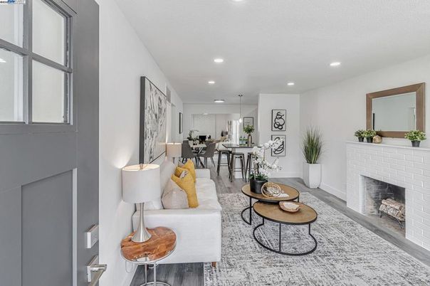 Dining room, Fireplace, Interior, Living room, Pendant Lights, Recessed Lighting, Wood Texture Flooring