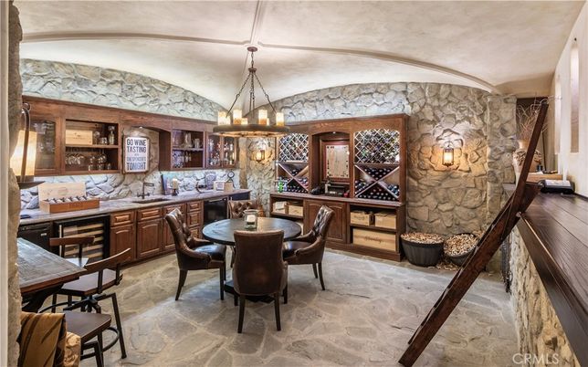 Chandelier, Dining room, Interior, Pendant Lights, Stone Walls